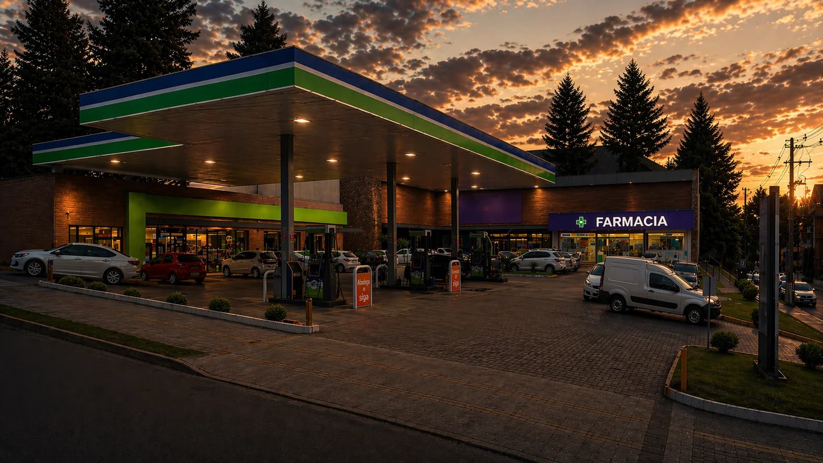 Posto de gasolina com farmácia ao lado ao entardecer, com estacionamento amplo na frente